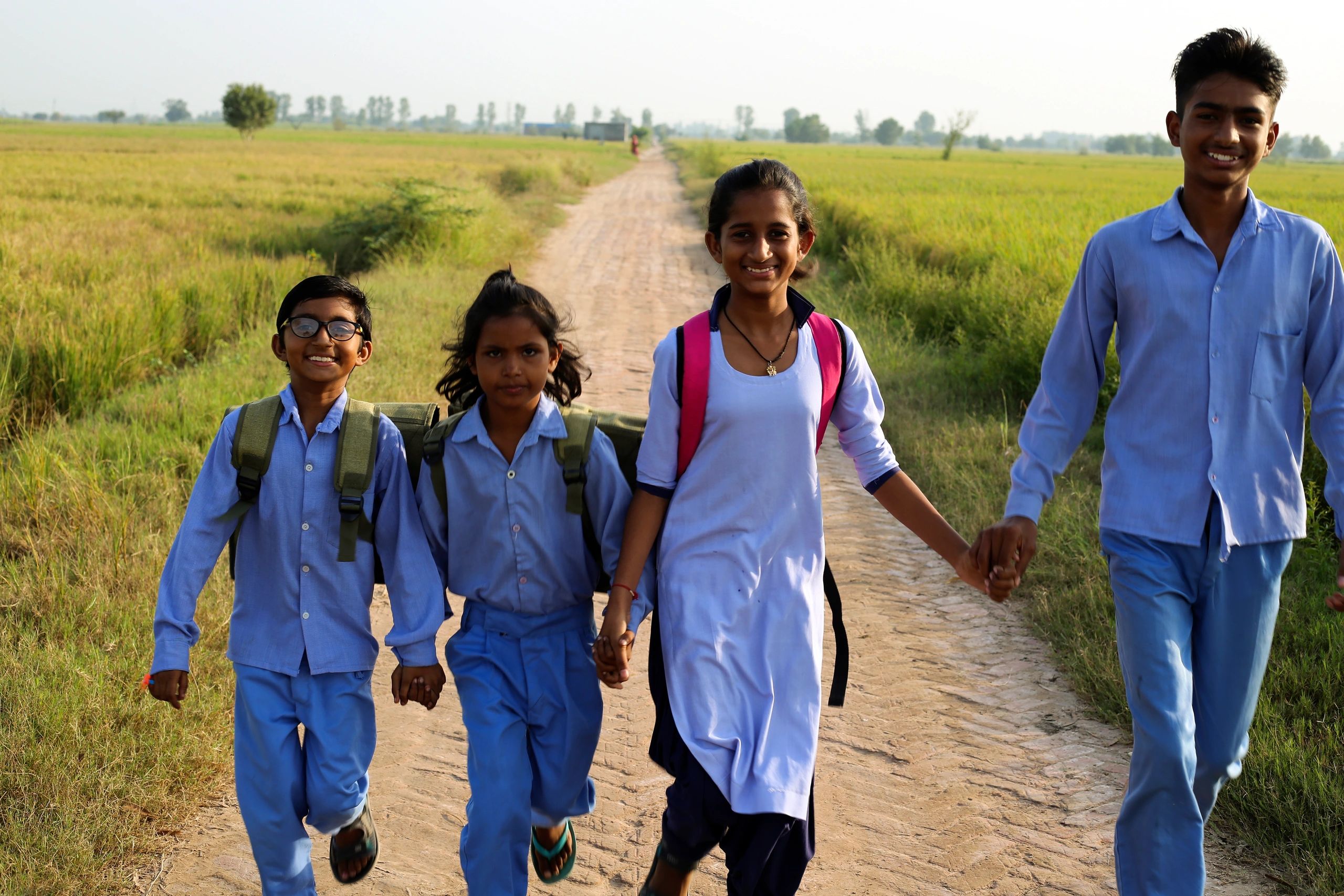 Students in school uniforms walking together after school